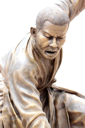Chinese Buddhist priest statue in the temple.の写真素材