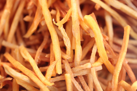 The snack made from fried potato with seasoning の写真素材
