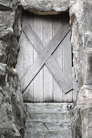 Old wooden door is closed it forbidden.の写真素材