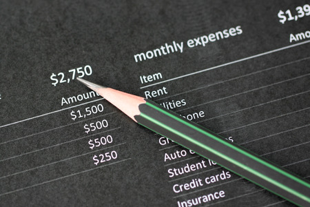  Pencil points to number on data paper for business concept.の写真素材