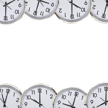 Partial view of the clock in frame on white background.