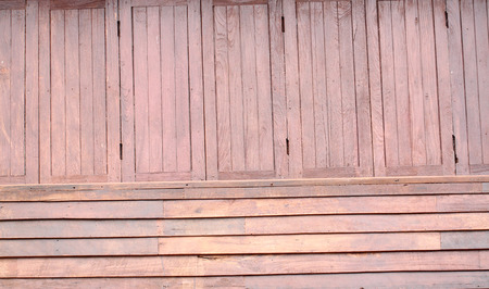Old wooden wall of a house in Thailand.の写真素材