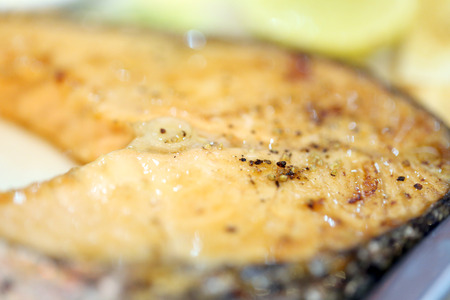 Salmon steaks on the dish in blur style. の写真素材