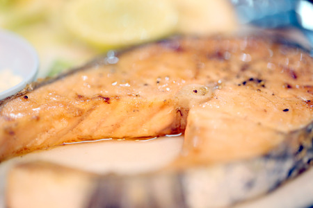 Salmon steaks on the dish in blur style. の写真素材