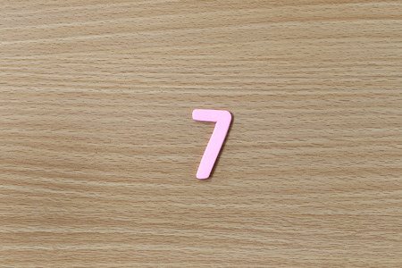 Arabic numbers of colorful on wood background.の写真素材