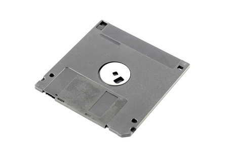 Black floppy disk isolated on white background.