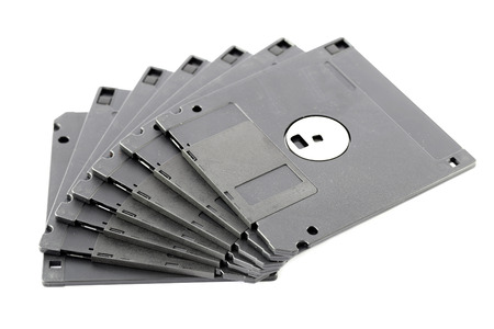 Black floppy disk isolated on white background.の写真素材