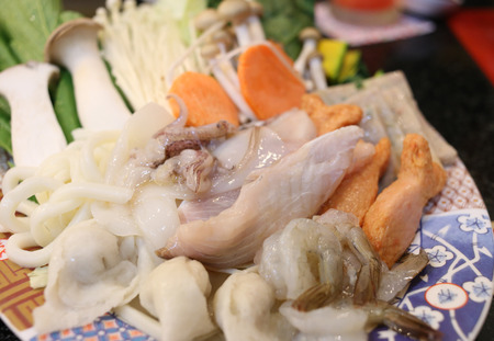 mixture of vegetable set and meat hot pot foods.の写真素材