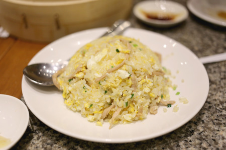 Fried rice on white dish at the restaurant.の写真素材