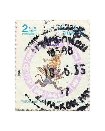 BANGKOK THAILAND - A old stamp printed in Thailand shows image Songkran festival of Thailand tradition,A stamp printed by Thailand Post circa 1992.のeditorial素材