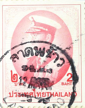 BANGKOK THAILAND - A old stamp printed in Thailand shows image of Great king rama 9 Thailand,A stamp printed by Thailand Post circa 1991.のeditorial素材