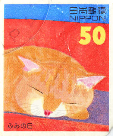 NIPPON - A old stamp printed in Japan shows image of Cat sleep circa 1994,JAPAN.のeditorial素材