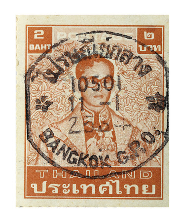 BANGKOK THAILAND - A old stamp printed in Thailand shows image of Great king rama 9 Thailand,A stamp printed by Thailand Post circa 1991.のeditorial素材