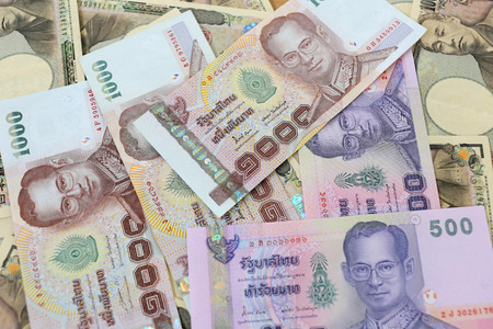 Banknotes of the Japan and Thailand money background.の写真素材