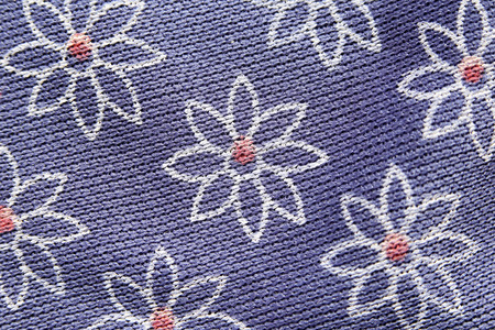Pattern flowers of purple fabric on the background.の写真素材