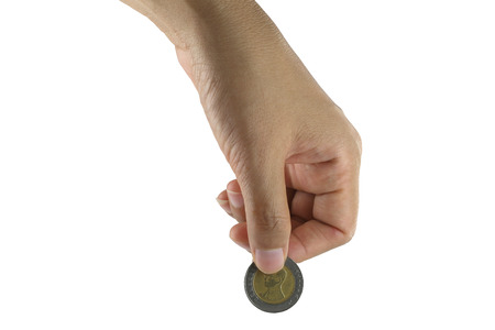 hand put coins isolated on white background の写真素材