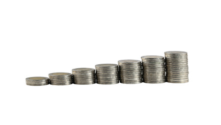 silver coin stack in concept of business growth on white backgroundの写真素材