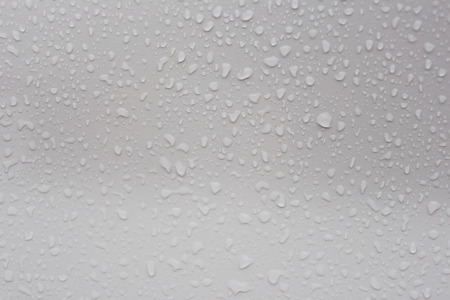 Rain drops on glass background for design.の写真素材