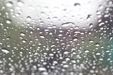 Rain drops on glass background for design.の写真素材