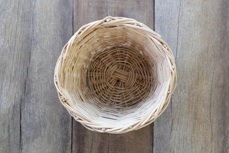 Basket weave of handicraft on old wooden for the design background.の写真素材