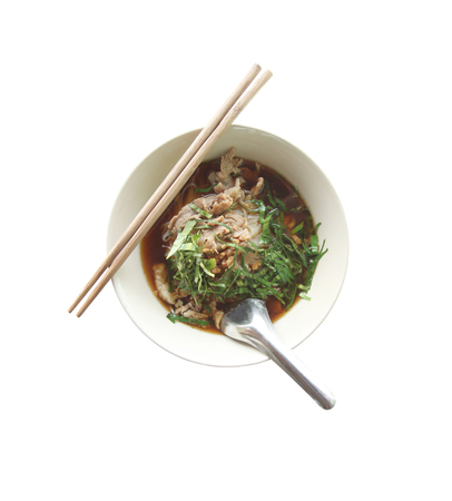 noodles with boiled pork in a bowl isolated on white background,This is a local Thai Foods and have...