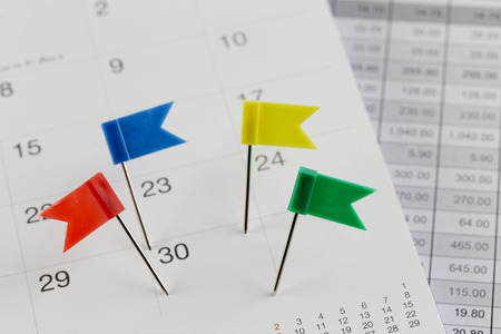 Pins to Wildcats on the calendar beside the number of thirty in business concept time and date.の写真素材