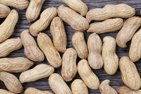 dry peanut on wooden background,concept of healthy food.の写真素材