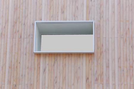 wooden windows of modern decoration on brown wood wall.の写真素材