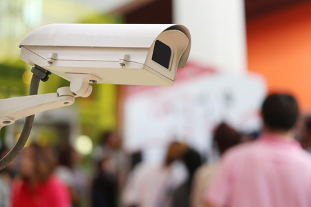 CCTV Camera Record on blur background of people in the Shopping mall,concept of security and safety.の写真素材