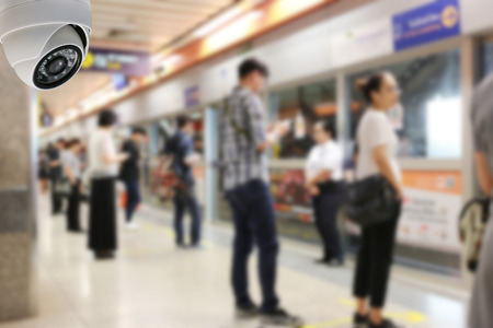 CCTV dome on the ceiling in the metro area in concept of security.の写真素材
