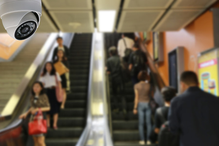 CCTV dome on the ceiling in the escalator of metro area in concept of security.の写真素材