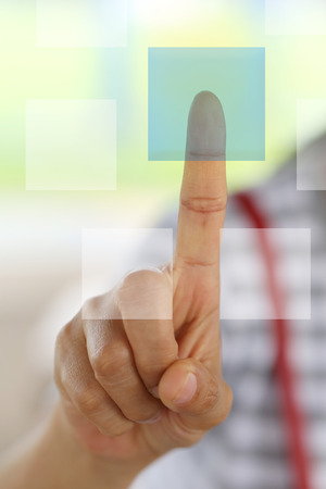 finger of women to touch empty blue button for your input text and design in work.の写真素材