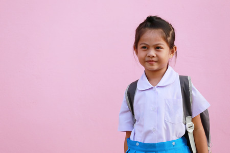 Asian girls in school uniform are smiling happily in concept of education and health.の写真素材