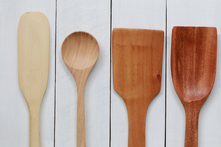 Wooden ladle for scoop on white wood and have copy space.の写真素材