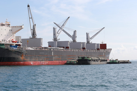 cargo ship in the sea,daytime sky.