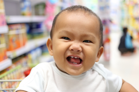 Face of an Asian child boy who is 1 year old,concept of health and growth.の写真素材
