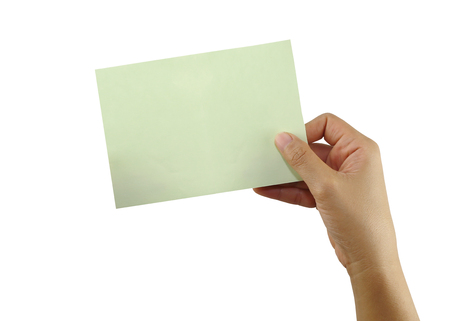 Hand of a people holding a empty green paper note isolated on white background for concept of your business ideas.の写真素材