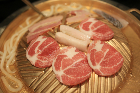 Grilled pork on a pan in the restaurant,This Popular food style in Thailand.の写真素材