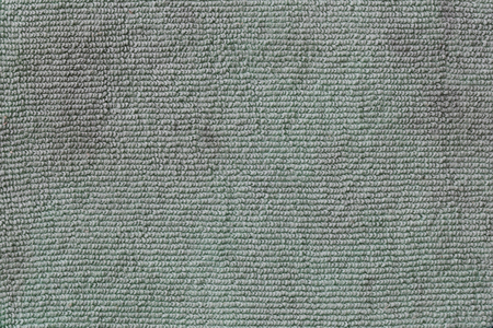 Green dirty fabric texture of surface textiles background for design backdrop in your work.の写真素材
