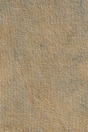 Orange dirty fabric texture of surface textiles background for design backdrop in your work.の写真素材