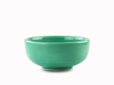 Green Japanese style plate or vintage bowl isolated on white backgroundの写真素材