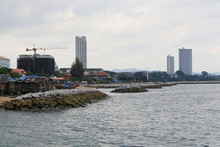 Stone of brake Wave sea in area coastal Thailand,Coastal and fishing communities of fisherman in the folk.のeditorial素材