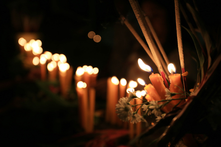 Candlelight at night of Rite of the Day of Religion and have copy space to input idea in your work.の写真素材