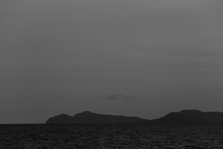 sea at night is overcast and have Moon light for design in your work nature concept.の写真素材