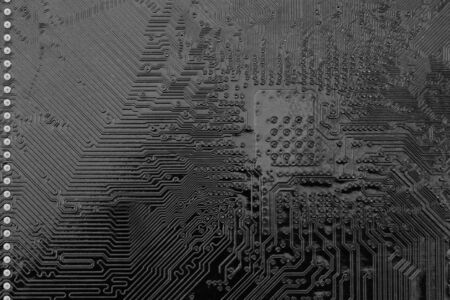 Black circuit mainboard of computer background for design in your work.