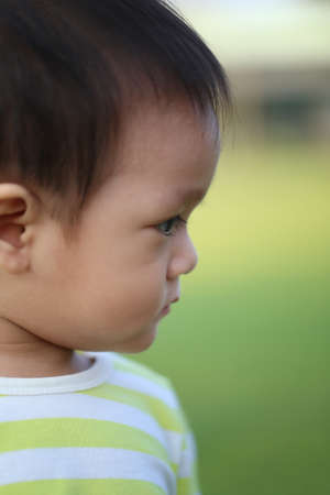 Facial features of Asian children,cuteness of childhood,Thailand boy aged about 1 year old.の写真素材