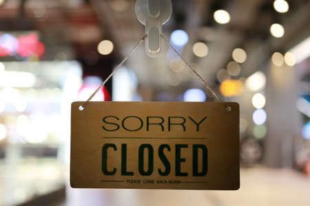 Shop closed of storefront sign,restaurant shows the closing status.の写真素材
