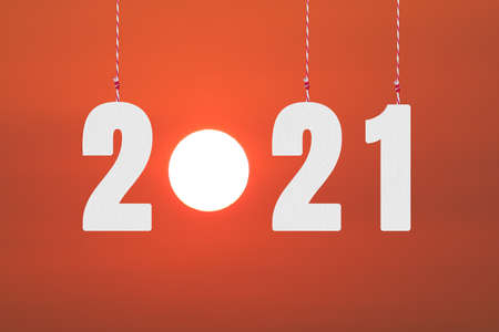 2021 text hanging by a rope in concept of new years for design in your work.