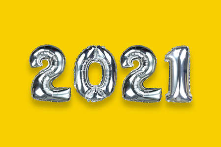 2021 text on the yellow background for design in your work Christmas and New Year.の写真素材