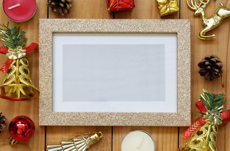Christmas decorations Picture frame on wooden floor and have copy space for design in your work.の写真素材